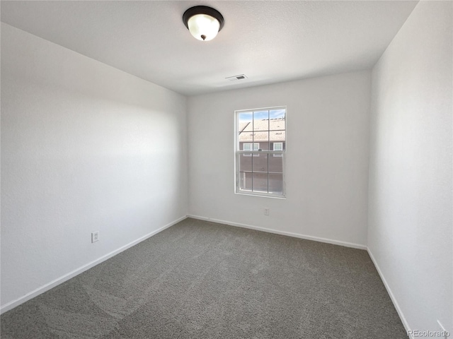 12713 Leyden St Unit E, Thornton, CO 80602 - carpeted empty room featuring baseboards