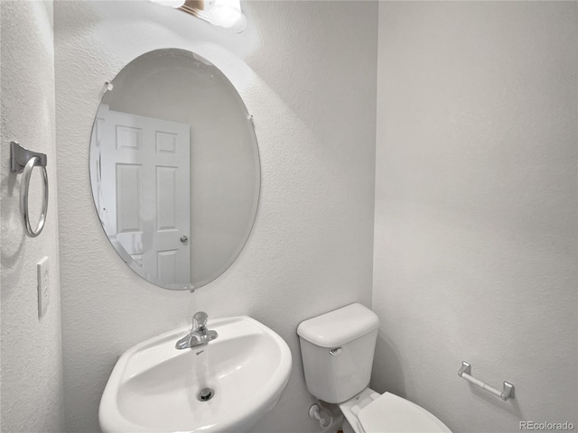 12713 Leyden St Unit E, Thornton, CO 80602 - bathroom with a sink and toilet