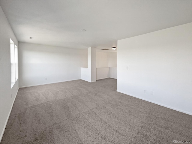 12713 Leyden St Unit E, Thornton, CO 80602 - carpeted spare room with baseboards