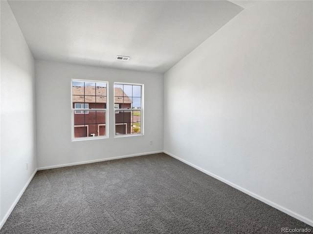 12713 Leyden St Unit E, Thornton, CO 80602 - carpeted spare room with baseboards