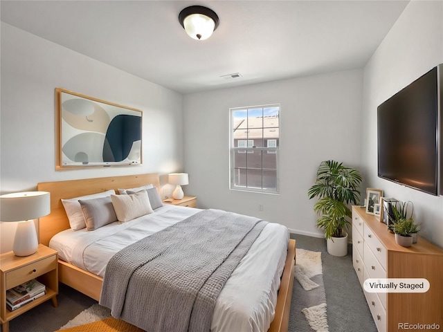 12713 Leyden St Unit E, Thornton, CO 80602 - carpeted bedroom featuring baseboards
