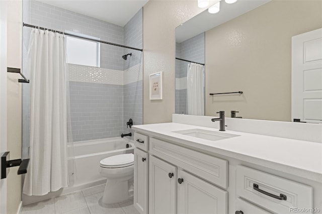 full bathroom with tile patterned flooring, vanity, shower / tub combo, and toilet