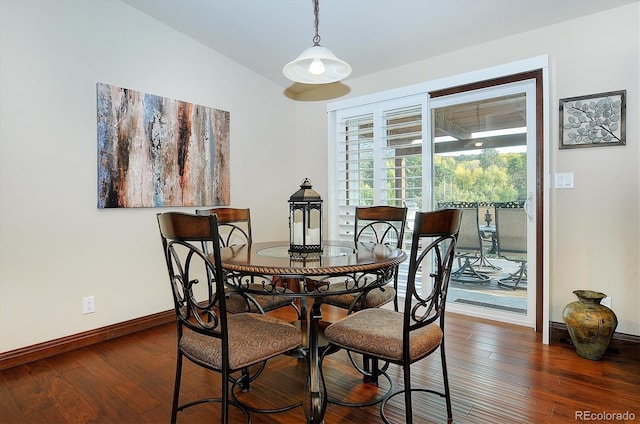 dining space featuring dark hardwood / wood-style floors