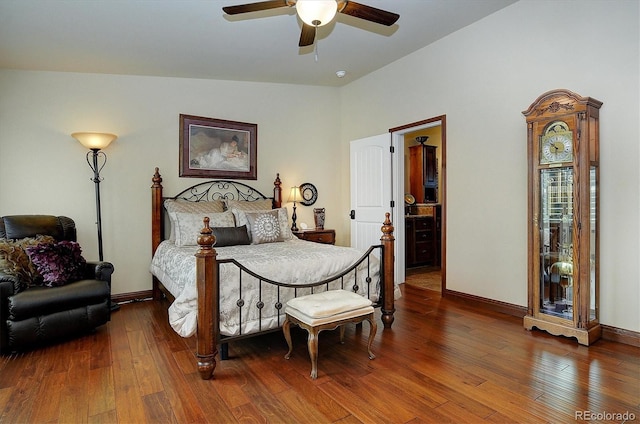 bedroom featuring vaulted ceiling, ceiling fan, and wood-type flooring