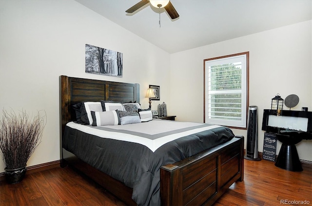 bedroom with lofted ceiling, ceiling fan, and dark wood-type flooring