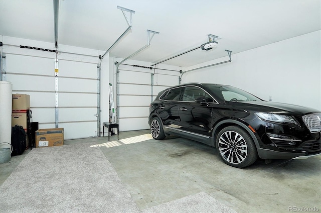 garage featuring a garage door opener