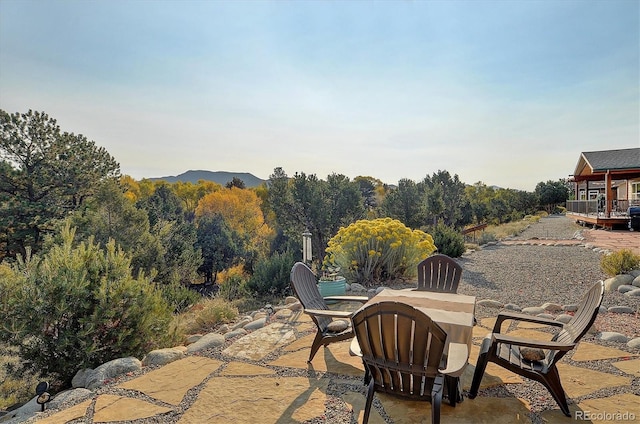 view of patio / terrace with a mountain view