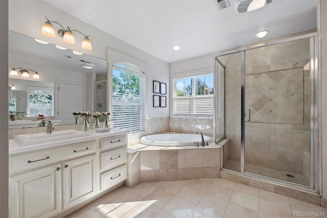 3330 E Tennessee Ave, Denver, CO 80209 - full bath with vanity, a garden tub, a stall shower, and tile patterned floors