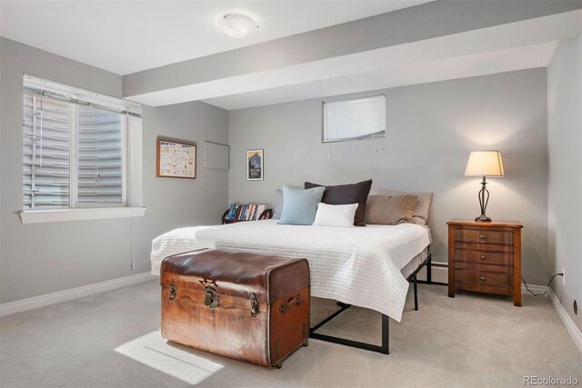 3330 E Tennessee Ave, Denver, CO 80209 - bedroom with light carpet and baseboards