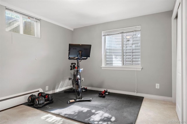 3330 E Tennessee Ave, Denver, CO 80209 - exercise area with plenty of natural light, baseboards, and a baseboard heating unit