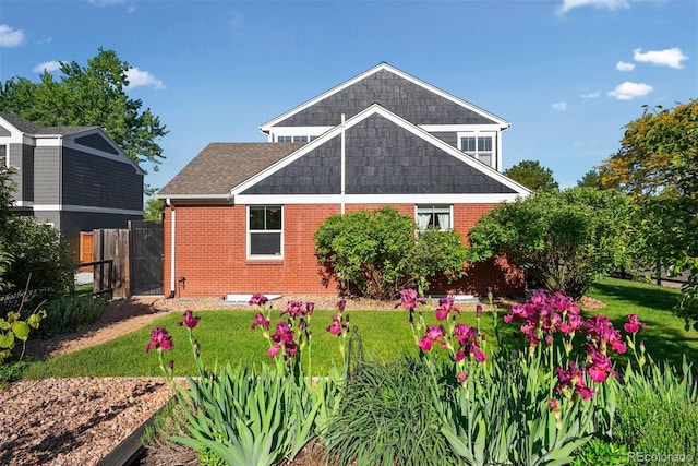 3330 E Tennessee Ave, Denver, CO 80209 - rear view of house featuring brick siding
