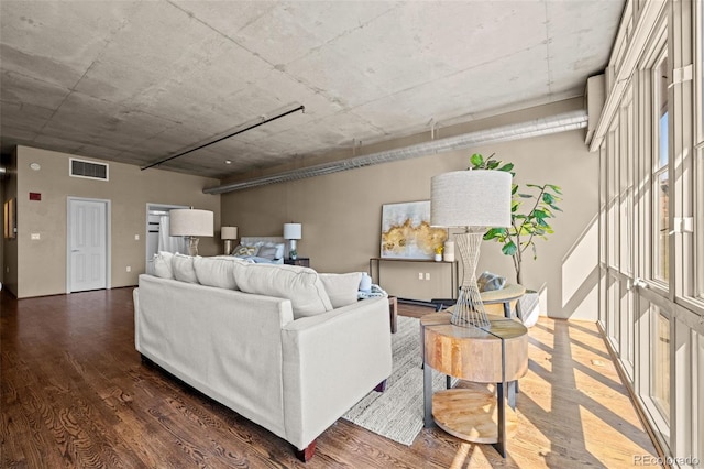 1499 Blake St Unit 2C, Denver, CO 80202 - living area featuring dark wood-type flooring