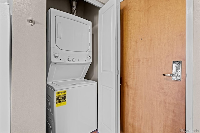 1499 Blake St Unit 2C, Denver, CO 80202 - laundry room featuring estacked washer and dryer