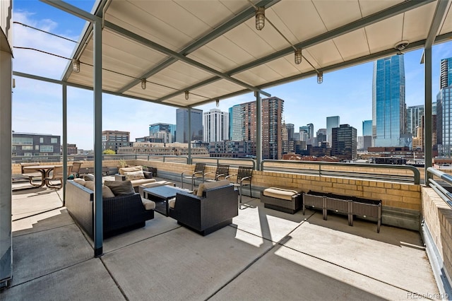 1499 Blake St Unit 2C, Denver, CO 80202 - view of patio / terrace featuring a skyline view and an outdoor hangout area