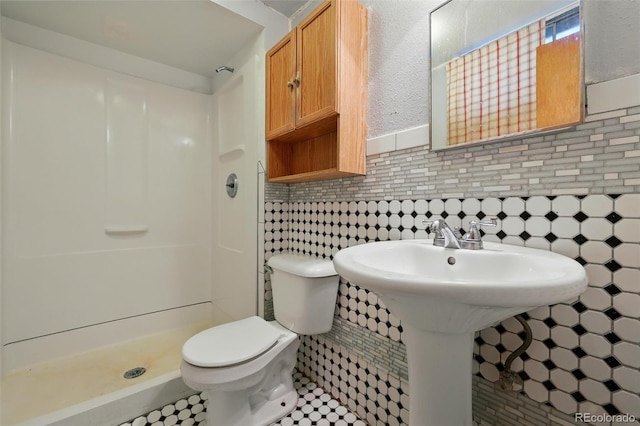 1111 Royale Dr, Colorado Springs, CO 80910 - full bath with a shower stall and tasteful backsplash