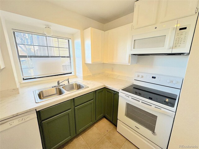 kitchen featuring sink, white cabinets, white appliances, and green cabinetry