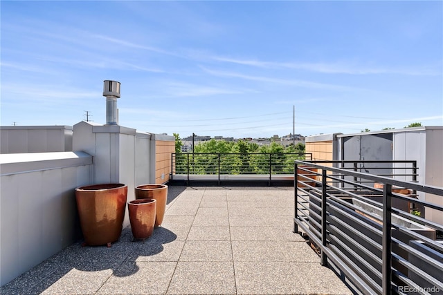 view of patio with a balcony