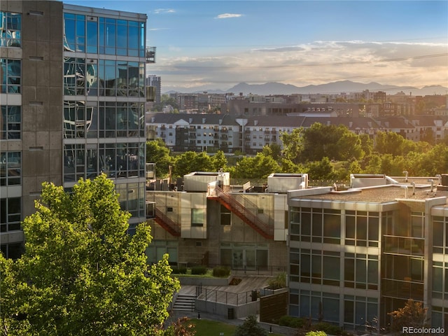 property's view of city with a mountain view