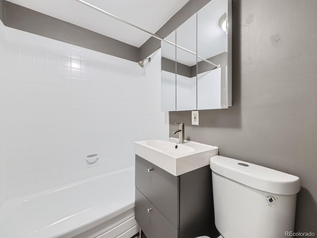 full bathroom featuring shower / tub combination, vanity, and toilet