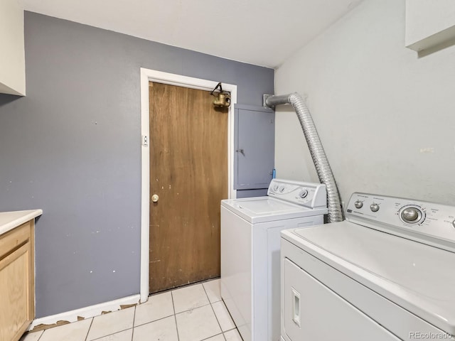 washroom featuring light tile patterned flooring and independent washer and dryer