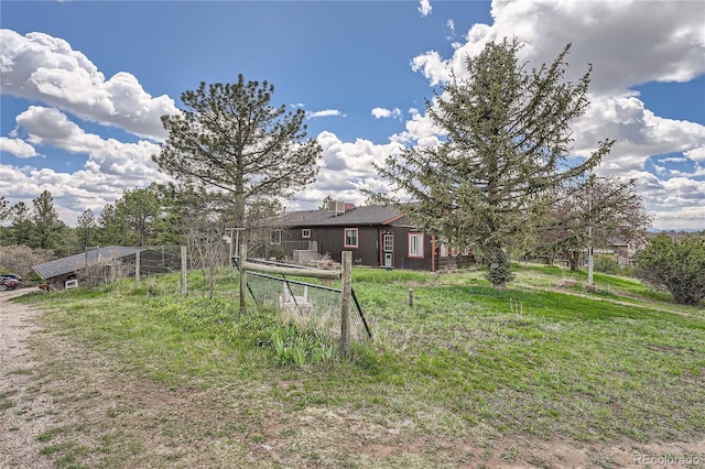 view of yard with fence