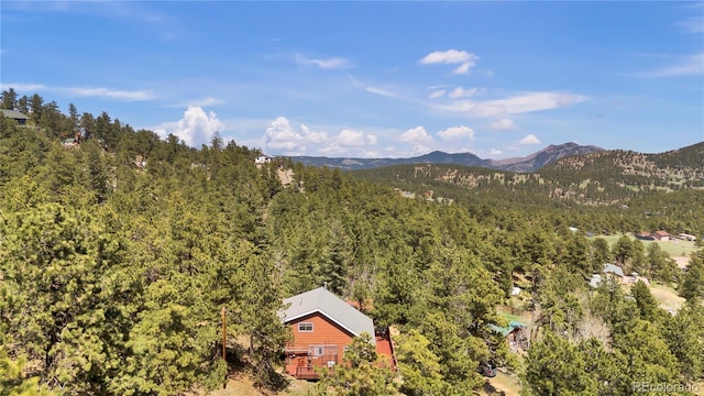 32187 Sylvan Rd, Golden, CO 80403 - mountain view featuring a heavily wooded area