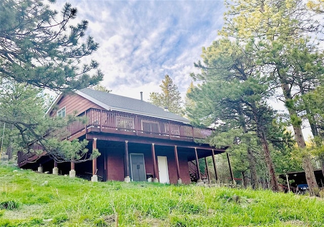32187 Sylvan Rd, Golden, CO 80403 - back of property featuring a wooden deck