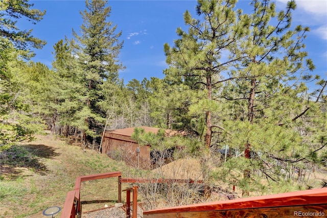 32187 Sylvan Rd, Golden, CO 80403 - view of yard with a forest view