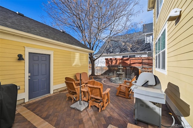 deck featuring area for grilling and a patio