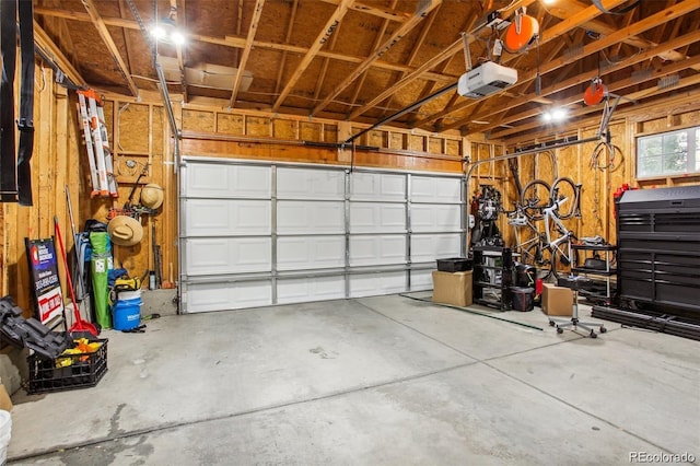 garage featuring a garage door opener