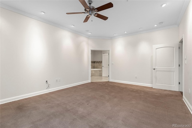 carpeted spare room with crown molding and ceiling fan