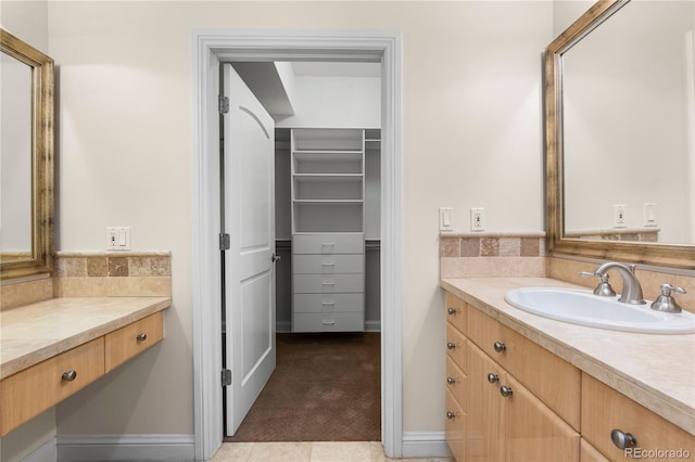 bathroom with vanity and tile patterned flooring