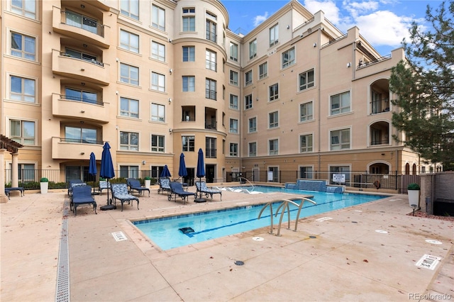 view of pool with a patio area