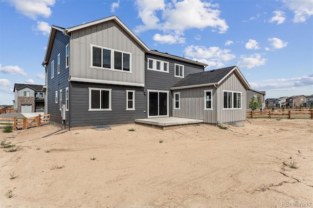 rear view of property with a patio area