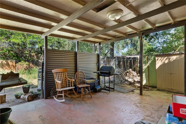 view of patio / terrace with fence and area for grilling