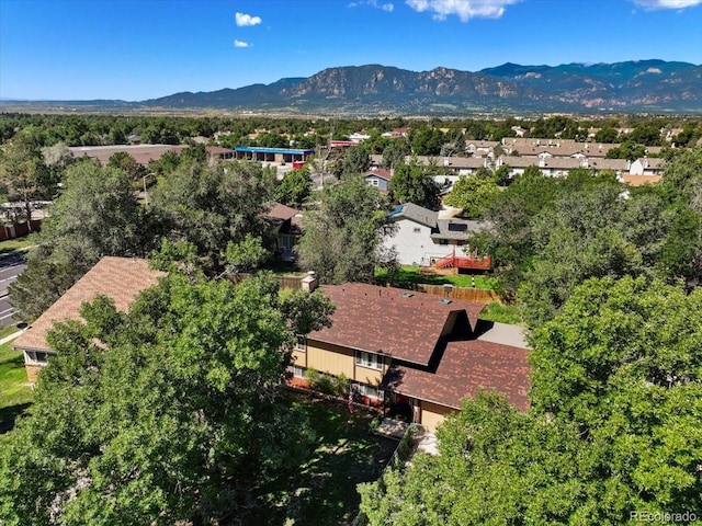 aerial perspective of suburban area with a mountain backdrop