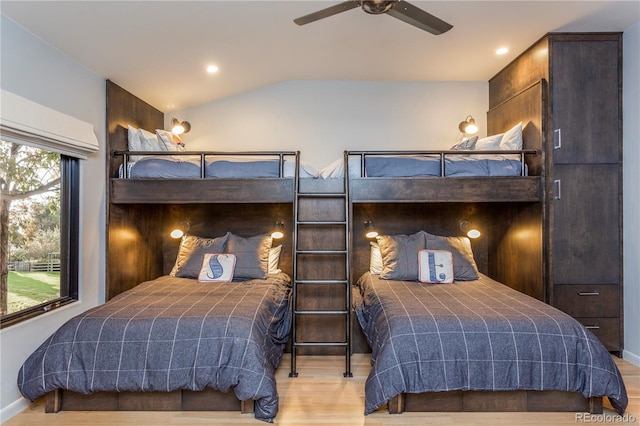 bedroom featuring light wood finished floors, recessed lighting, a ceiling fan, vaulted ceiling, and baseboards