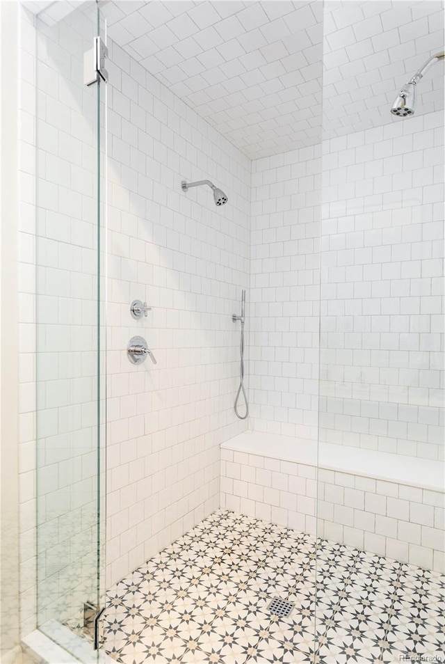 bathroom featuring a stall shower