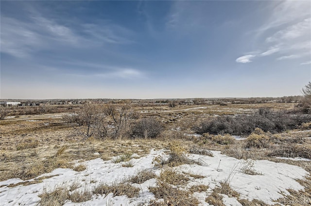 view of snow covered land