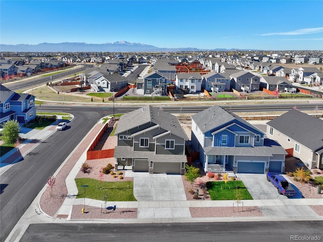 drone / aerial view featuring a mountain view