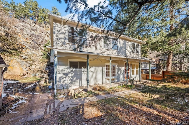 view of front of property featuring covered porch