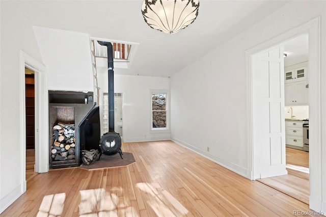 unfurnished living room with light hardwood / wood-style floors