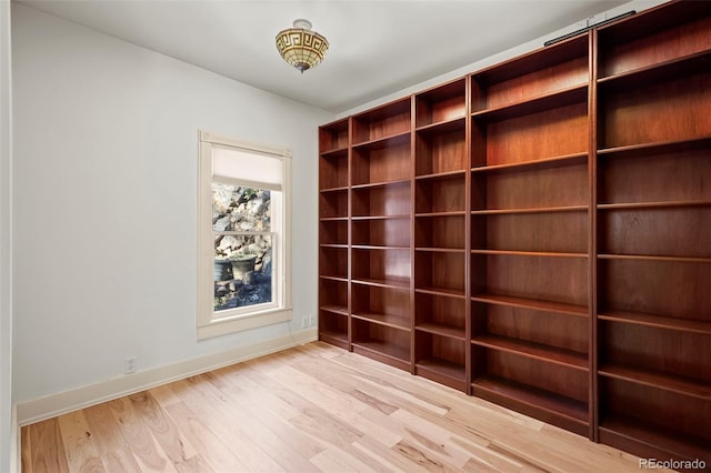 spare room featuring light hardwood / wood-style floors