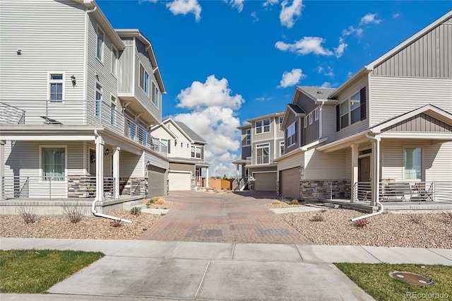 10124 Xanadu St, Commerce City, CO 80022 - view of road featuring concrete driveway and a residential view