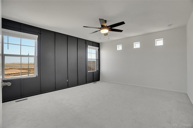 10124 Xanadu St, Commerce City, CO 80022 - carpeted spare room featuring visible vents and ceiling fan