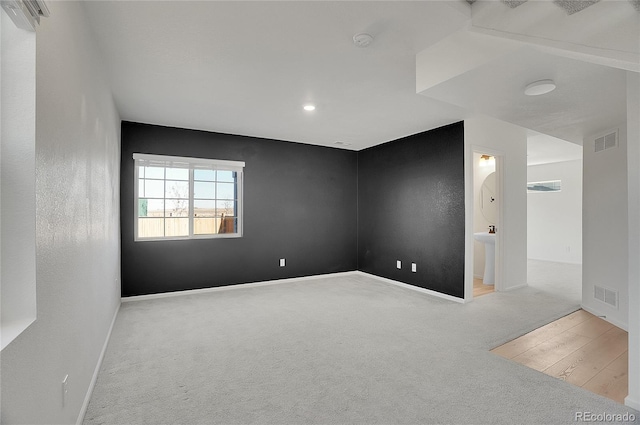 10124 Xanadu St, Commerce City, CO 80022 - spare room with visible vents, baseboards, and carpet floors