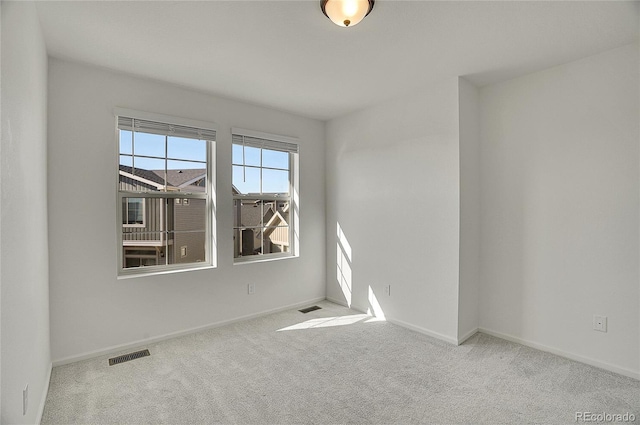 10124 Xanadu St, Commerce City, CO 80022 - empty room with baseboards, visible vents, and carpet floors
