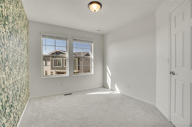 10124 Xanadu St, Commerce City, CO 80022 - carpeted empty room with visible vents and baseboards