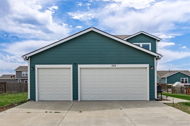329 S 3rd Ave, Deer Trail, CO 80105 - view of front of home featuring a garage