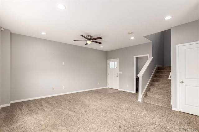 329 S 3rd Ave, Deer Trail, CO 80105 - unfurnished living room with carpet, a ceiling fan, recessed lighting, and stairs